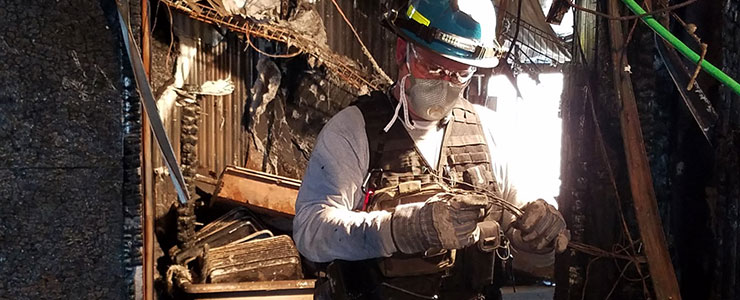 Investigator at a fire scene