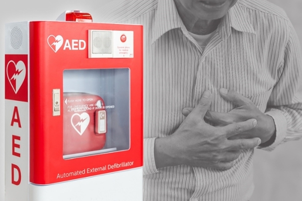 Automated external defibrillator; man with hand on his chest