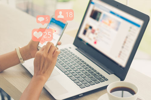 person liking social media posts on a phone