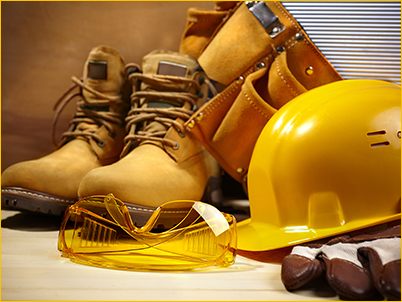 PPE, including a hard hat, gloves, safety glasses and work boots.