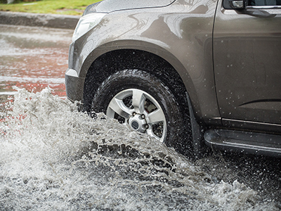Car driving in the rain.