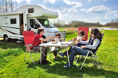 Family in front of RV